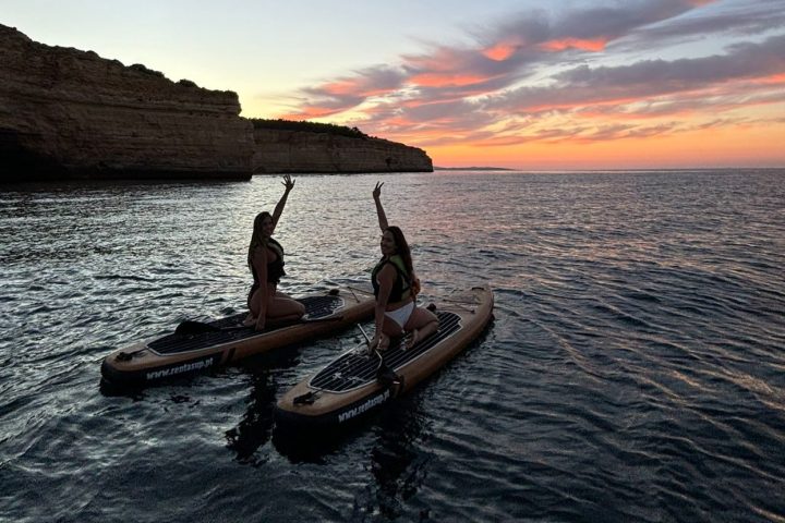 a sunset over a body of water